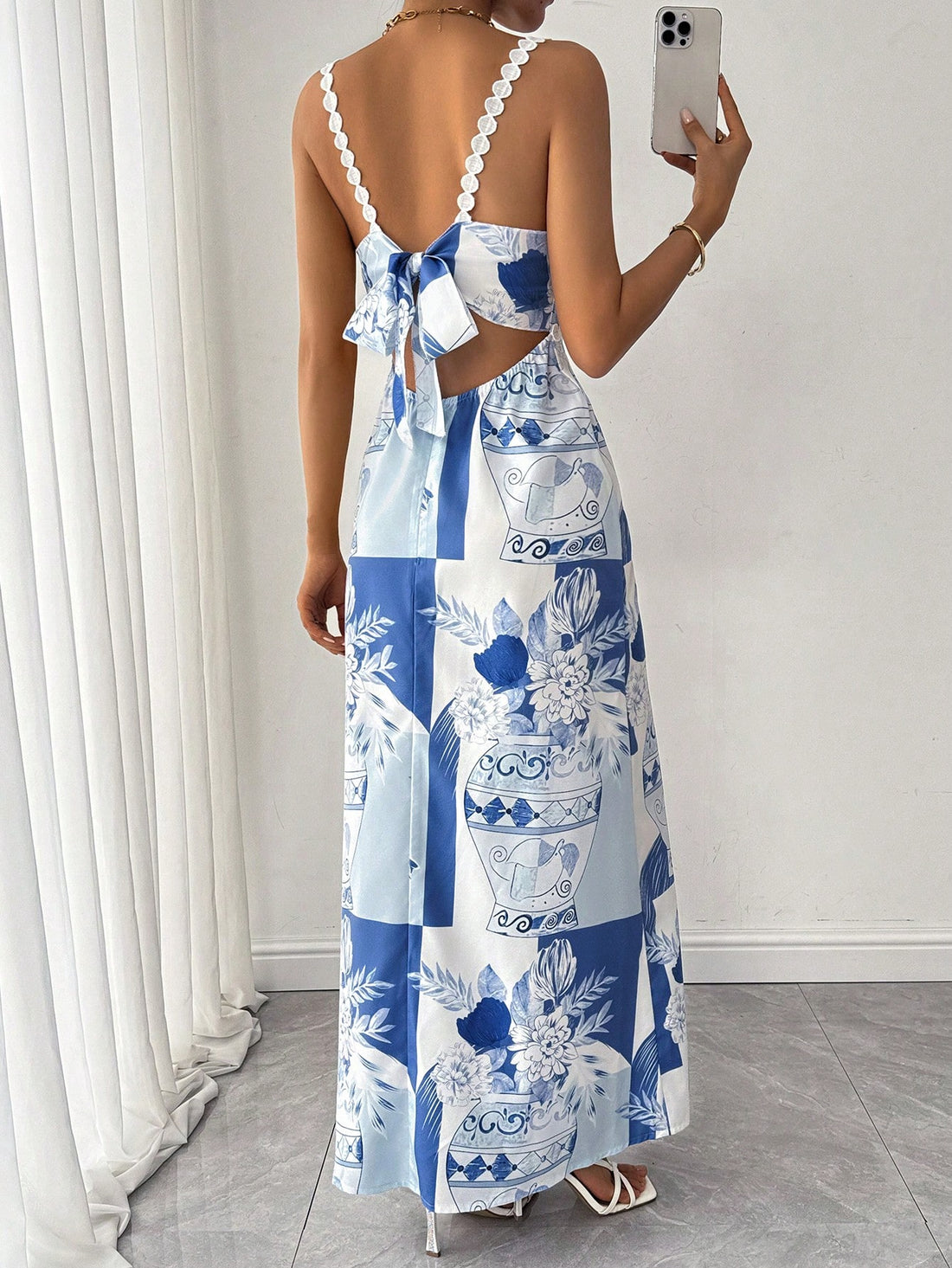 Step up your party style with our Chic Floral Tie-Up Maxi Dress! This dress is perfect for any fun night out, with its stylish and playful tie-up design. Its vibrant floral print adds a touch of quirkiness to your look. Make a statement and turn heads at any party with this must-have dress.