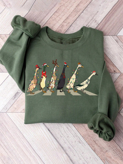 Festive Quackers: Women's Funny Christmas Duck Sweatshirt