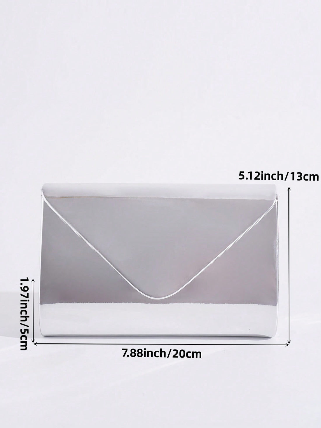 Shine bright wherever you go with this Elegant Silver Metallic Clutch Bag! Crafted from glossy PU leather, it’s the perfect playful accessory to keep your phone and lipstick close. Its sleek design adds a dash of sparkle to any outfit, making it easy to switch from day to night with style and ease. Compact yet roomy enough for essentials, this clutch is ready to party with you!