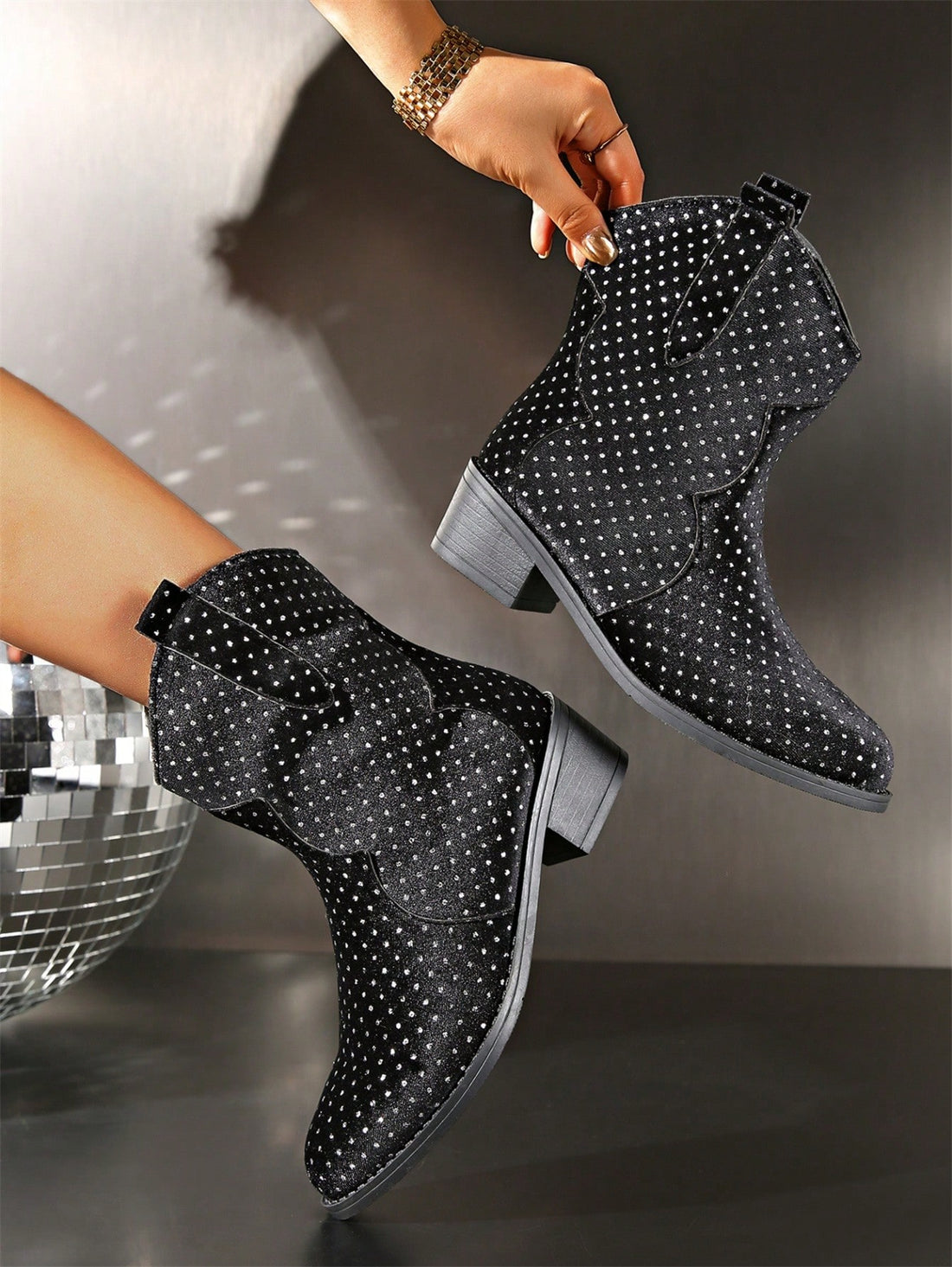 Step out in style and comfort with our Chic Minimalist Ankle Boots. The glitter details add a touch of glam while the comfortable and anti-slip design ensures functionality. These versatile boots are the perfect addition to any outfit, making them a must-have for any fashion-forward individual.