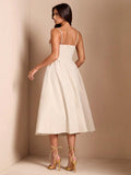 Back view ivory midi dress with adjustable straps fitted waist and flared skirt