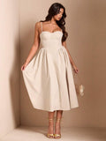 Ivory sweetheart midi dress with gathered skirt gold heels and shell bag