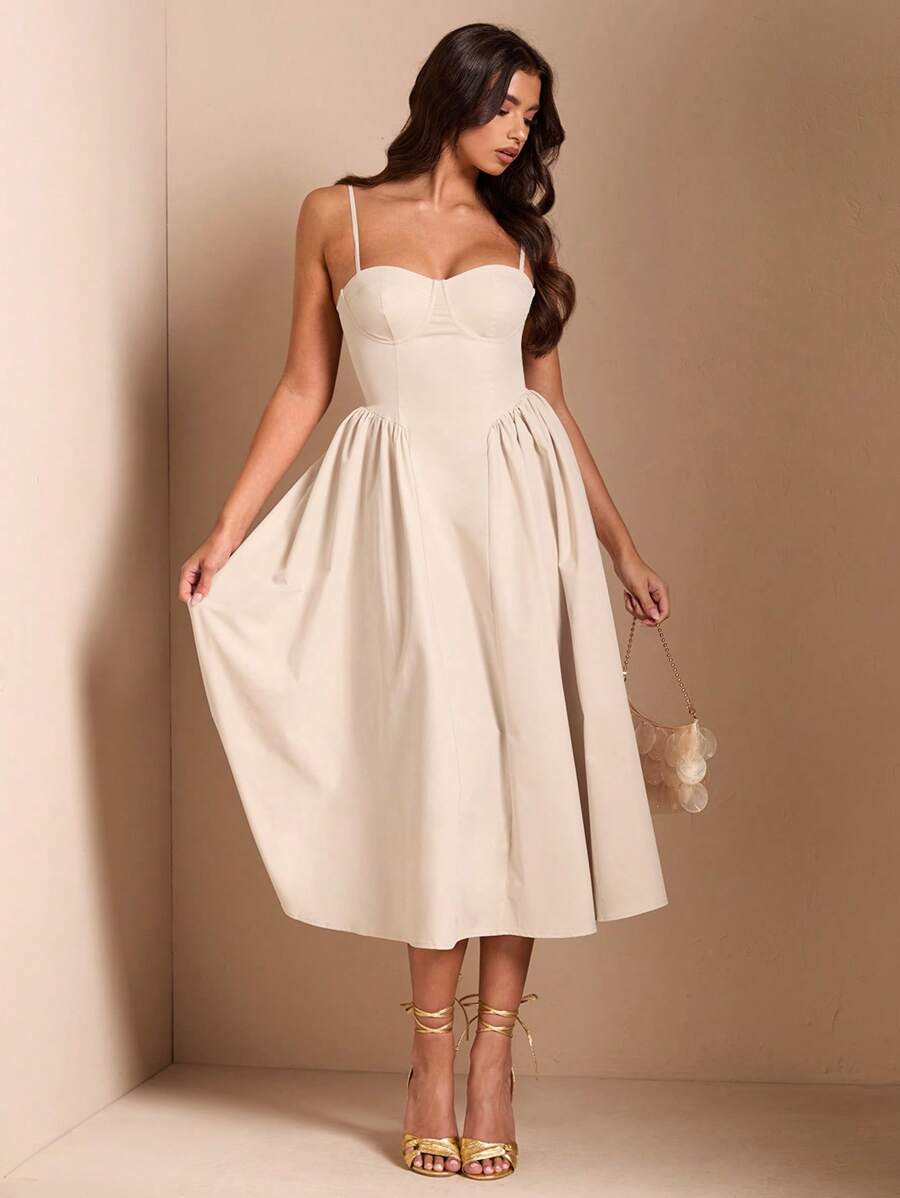 Ivory sweetheart midi dress with gathered skirt gold heels and shell bag