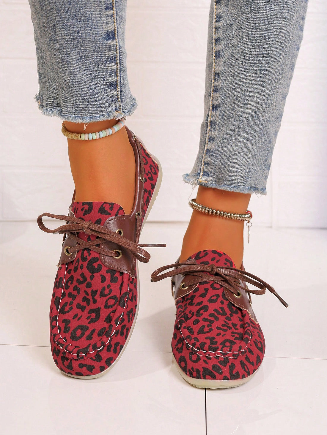 Discover a new level of comfort with our Wildly Comfortable Leopard Print Lace-Up Jelly Casual Flats for Women. The combination of stylish leopard print and adjustable lace-up design provide the perfect balance of fashion and function. Made with high-quality materials, these flats are sure to become your new go-to for everyday wear.