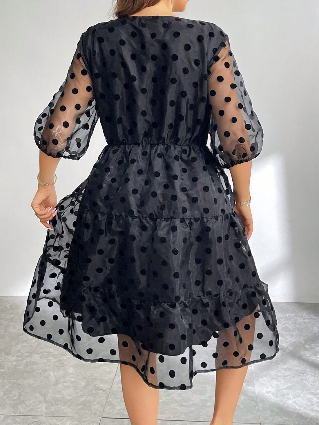 Step out with playful charm in this Chic Plus Size Flocked Polka Dot A-Line Mesh Dress. Its soft, sheer mesh and bold polka dots create a fun yet flattering silhouette that moves with you. The A-line cut offers comfortable ease, making it perfect for day-to-night wear with effortless style.