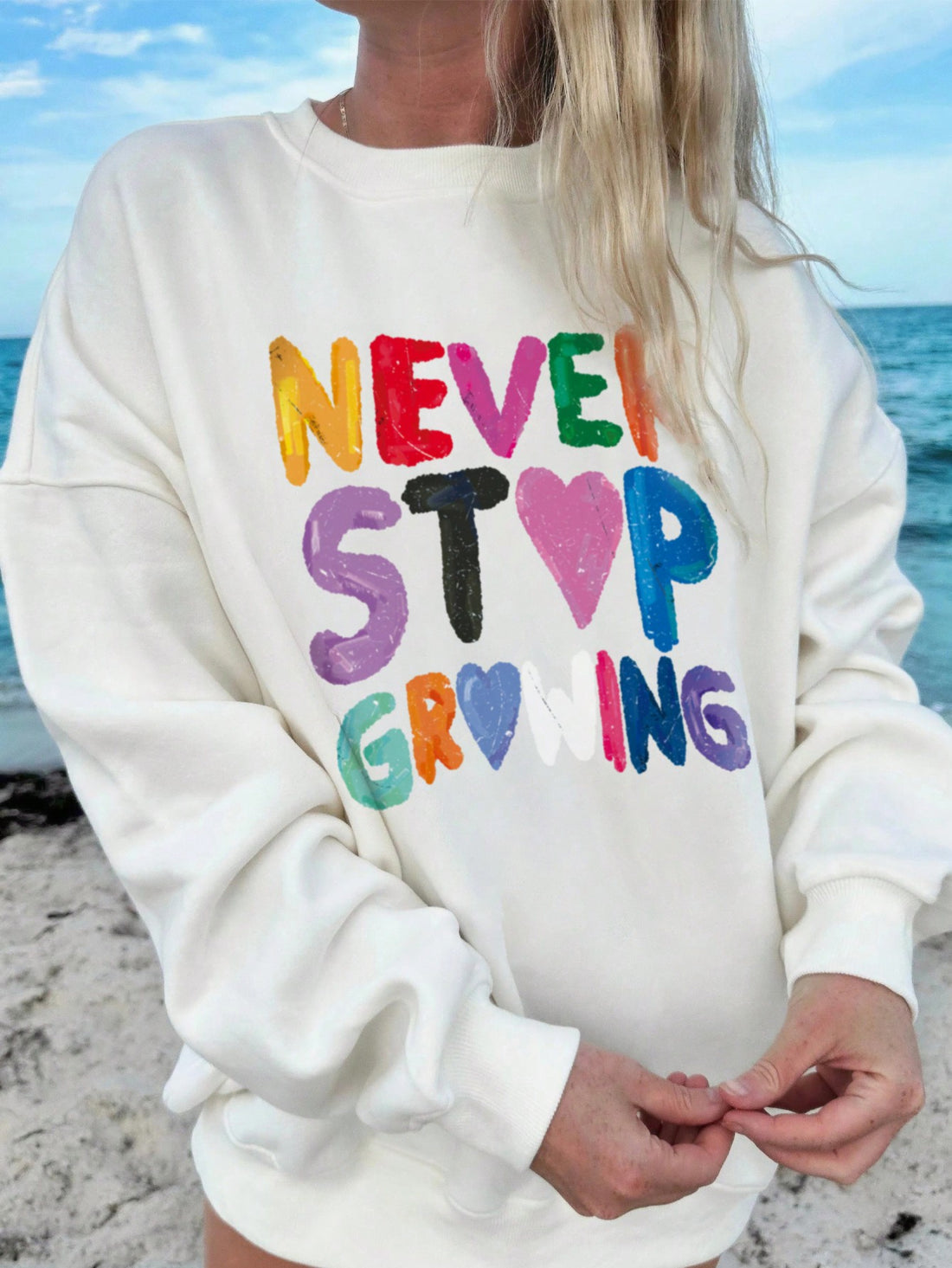 Stay stylish and cozy this autumn with our Chic & Casual sweatshirt. Featuring a colorful letter print and long sleeves, this sweatshirt is the perfect addition to your wardrobe. Made for both comfort and fashion, it's the ideal choice for any casual occasion.