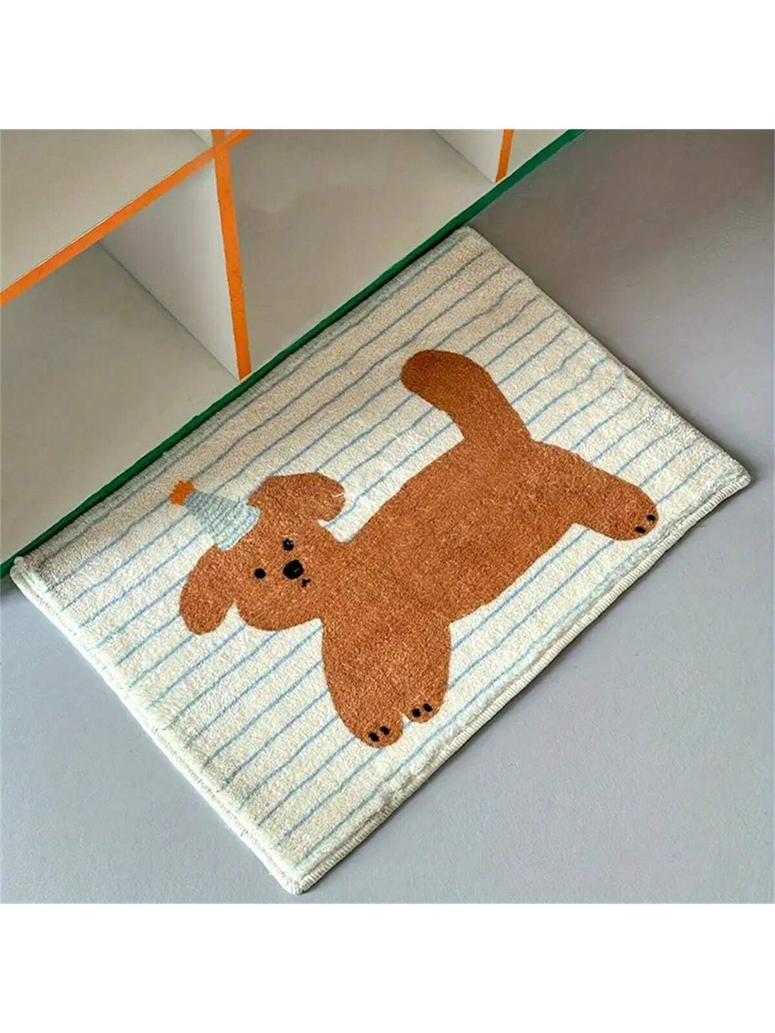 Add a splash of fun to your bathroom with this Charming Cartoon Dog Bath Mat! Its soft, plush surface quickly absorbs water, keeping your floors dry and cozy. The non-slip backing ensures safety, while the playful dog design brightens up your home decor. Easy to clean and machine washable, this mat combines practicality with a touch of whimsy for your everyday routine.