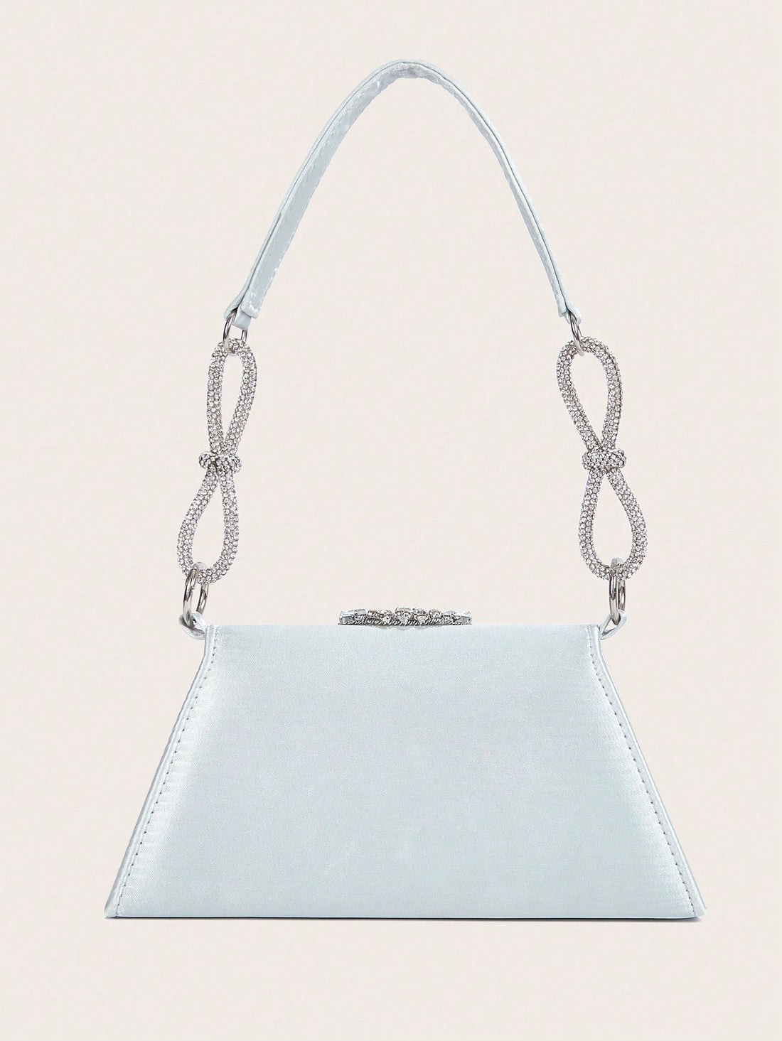 This Luxe Black Crossbody Bag with Diamond Bow is the perfect accessory for any evening event. With its elegant design and diamond bow accent, it's sure to add a touch of sophistication to your outfit. The crossbody style allows for hands-free convenience while the spacious interior can hold all your essentials. Perfect for parties and weddings.