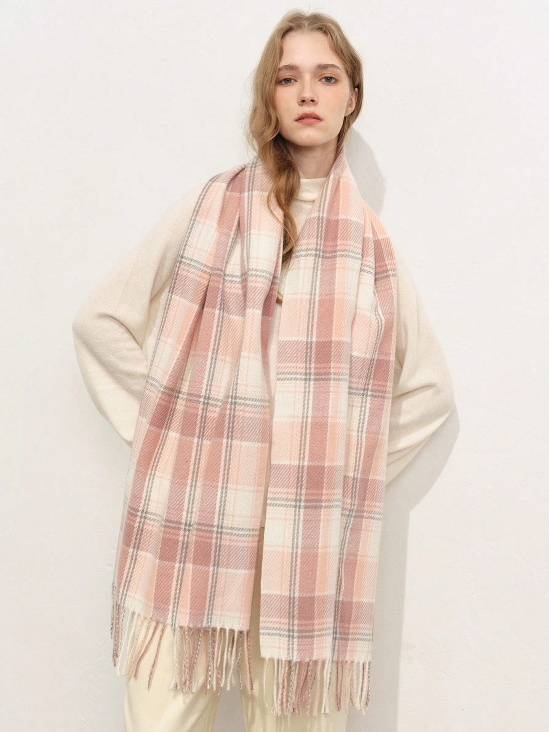 Elevate your style this season with the Chic Classic Plaid Scarf. Crafted with timeless plaid design, this scarf adds a touch of elegance and warmth to your autumn and winter outfits. Made from high-quality materials, this scarf is a must-have accessory for any fashion-savvy individual.