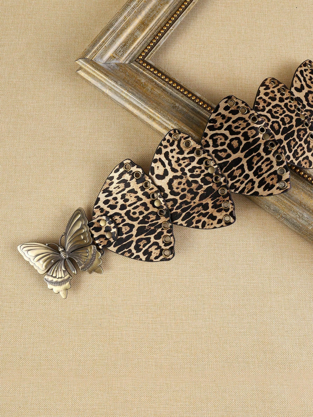 This stylish Chic Leopard Print Butterfly Waist Belt is perfect for any season and complements a bohemian wardrobe. Its unique pattern and butterfly design add a touch of elegance and character to any outfit. Made with high-quality materials, this belt is both fashionable and functional.