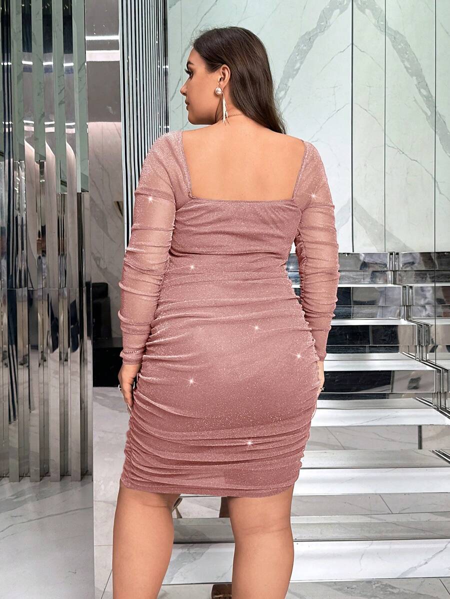 Slip into the spotlight with this show-stopping plus-size bodycon dress that's pure magic. The off-shoulder neckline frames your face beautifully while the ruched detailing flatters your curves in all the right ways. Covered in shimmering glitter, this dress catches every light and every eye—perfect for nights when you want to feel absolutely fabulous. Whether you're hitting the dance floor or turning heads at a special event, this glamorous piece delivers confidence and style in one stunning package.