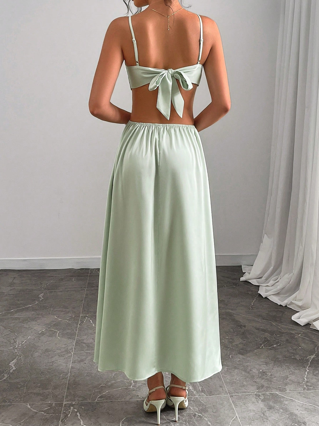 This Elegant 3D Floral Contrast Color Sleeveless Slip Dress for Women is designed for the stylish and sophisticated woman. Crafted with intricate 3D floral detailing and a striking contrast color, this dress exudes elegance and femininity. The sleeveless design adds a touch of sophistication, making it perfect for any special occasion.