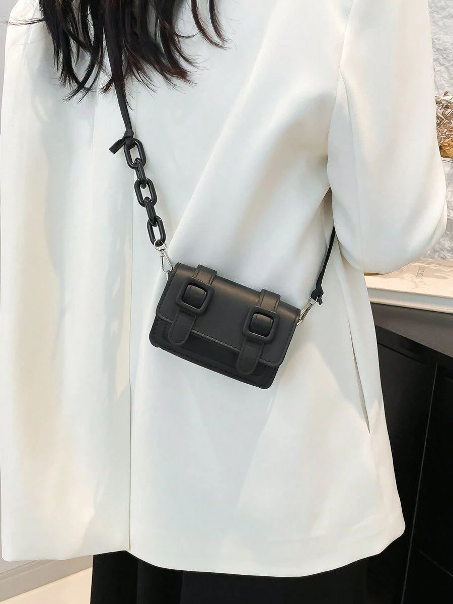 Lifestyle styling of multicolor mini bag with casual summer outfit