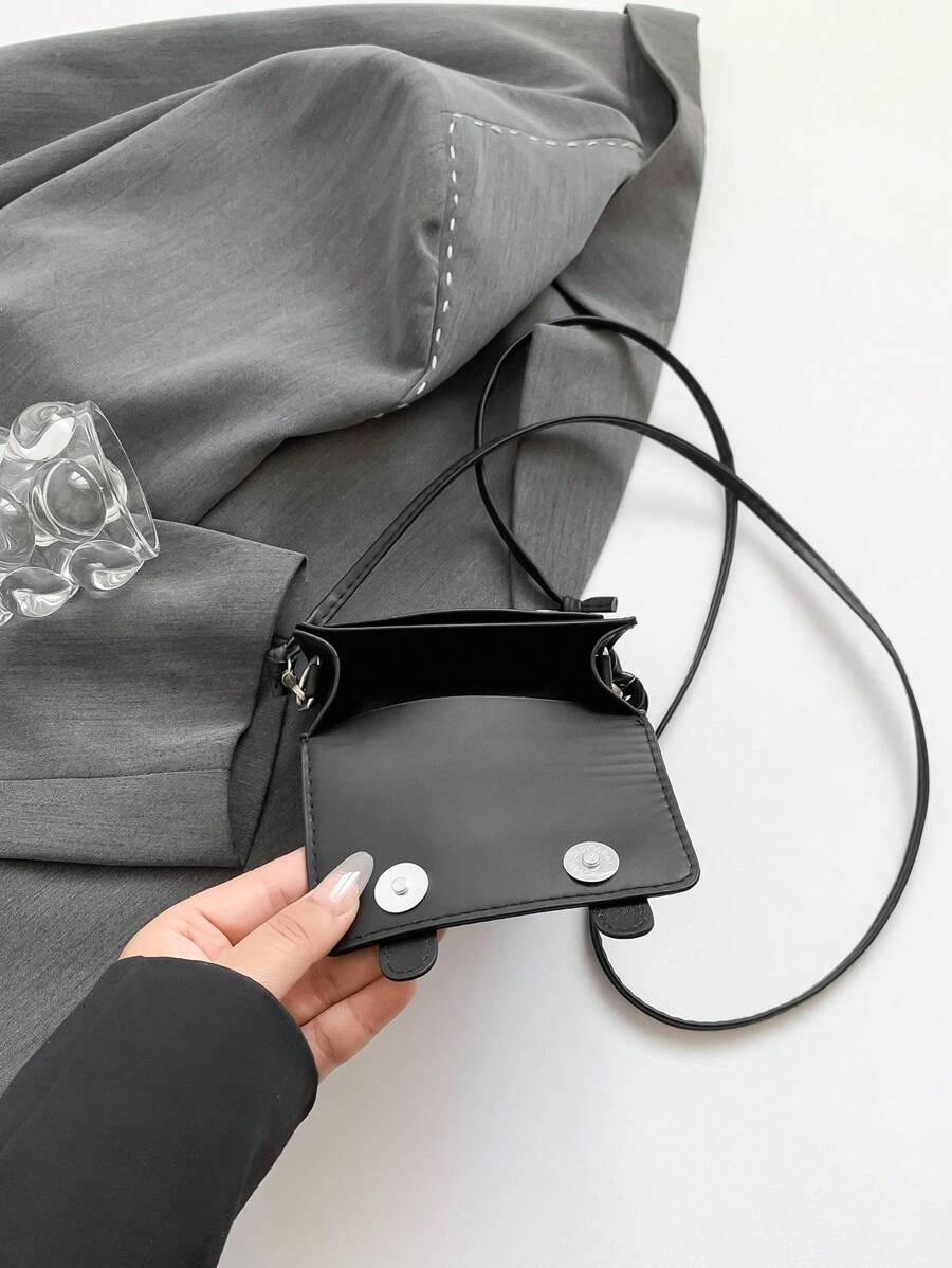 Lifestyle styling of colorful mini crossbody bag with preppy fashion look