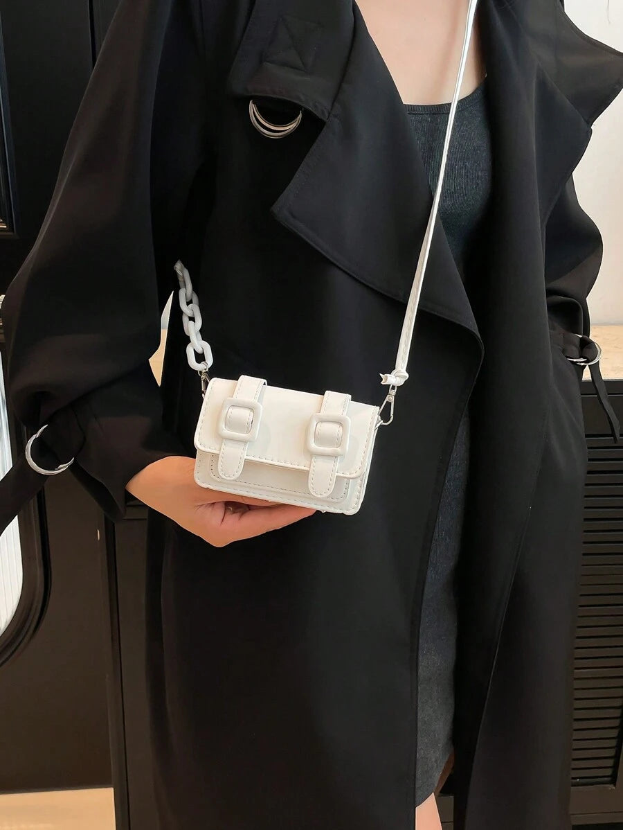 Lifestyle carry view of the mini crossbody bag for daily errands