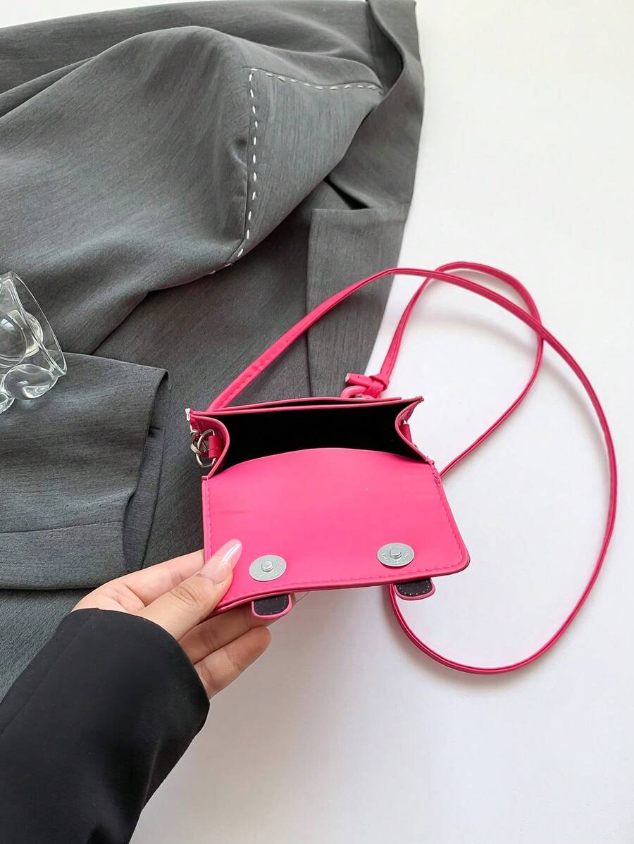 Back detail of compact mini chain crossbody bag