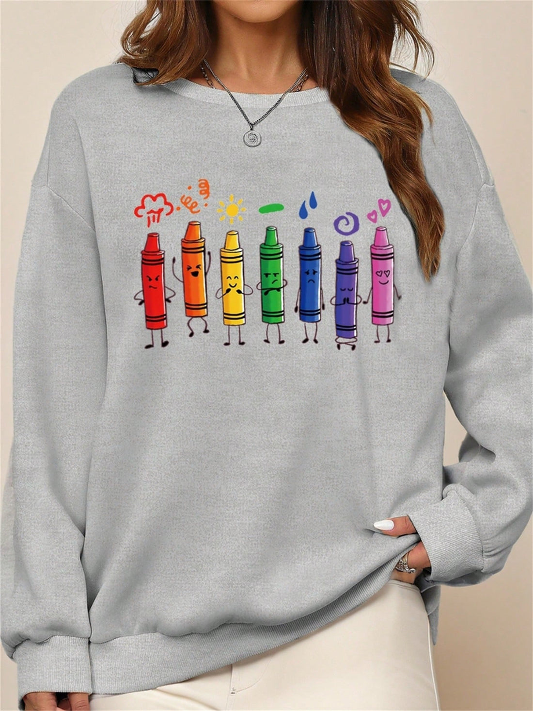 The Colorful Crayon Print Sweatshirt is the perfect casual wear for Teachers' Day. Show off your artistic side with the vibrant and fun crayon print, while staying comfortable and stylish. Made from high-quality materials, this sweatshirt is perfect for any teacher looking for a unique and playful addition to their wardrobe.