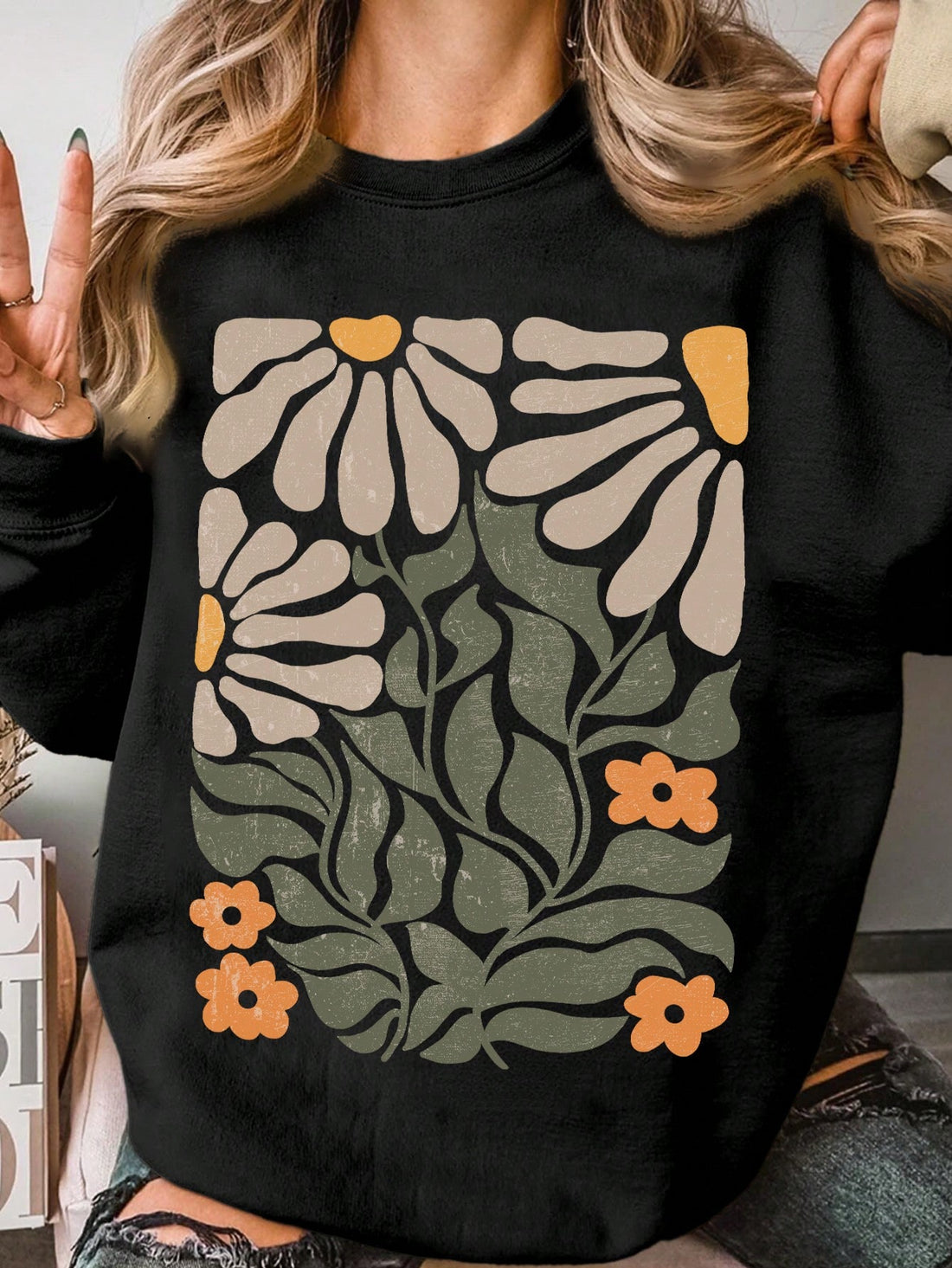 Embrace cozy vibes with this Geometric Floral Print Oversized Crew Neck Sweatshirt for Women. Its roomy fit and charming floral design add a playful twist to your autumn and winter wardrobe. Perfect for layering on chilly days, it keeps you comfy while turning heads with its unique pattern. Whether you're lounging at home or out for a casual stroll, this sweatshirt brings warmth and style together effortlessly.