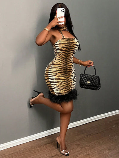 Fierce & Fabulous: Leopard Print Backless Mini Dress with Fuzzy Trim