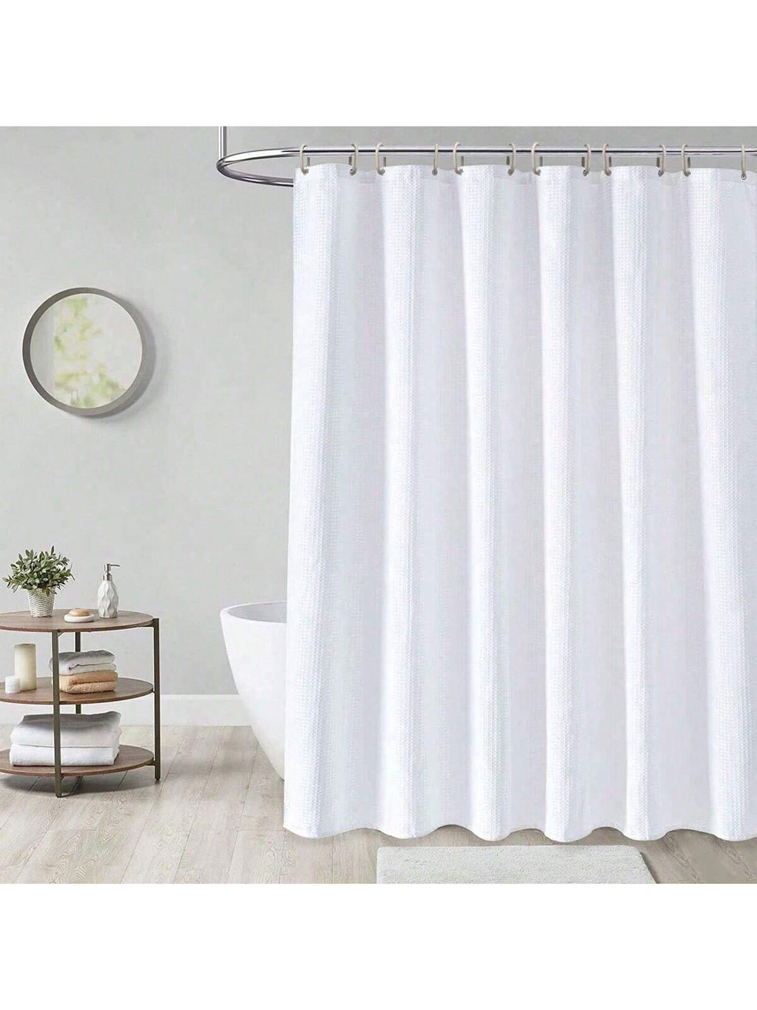 Take your shower game to the next level with our Enhanced Beige Waffle Shower Curtain! Not only is it waterproof and wrinkle-resistant, but it also comes with C-shaped hooks for easy installation. Say goodbye to boring showers and hello to a stylish and hassle-free experience. (Sorry, rubber ducky not included.)