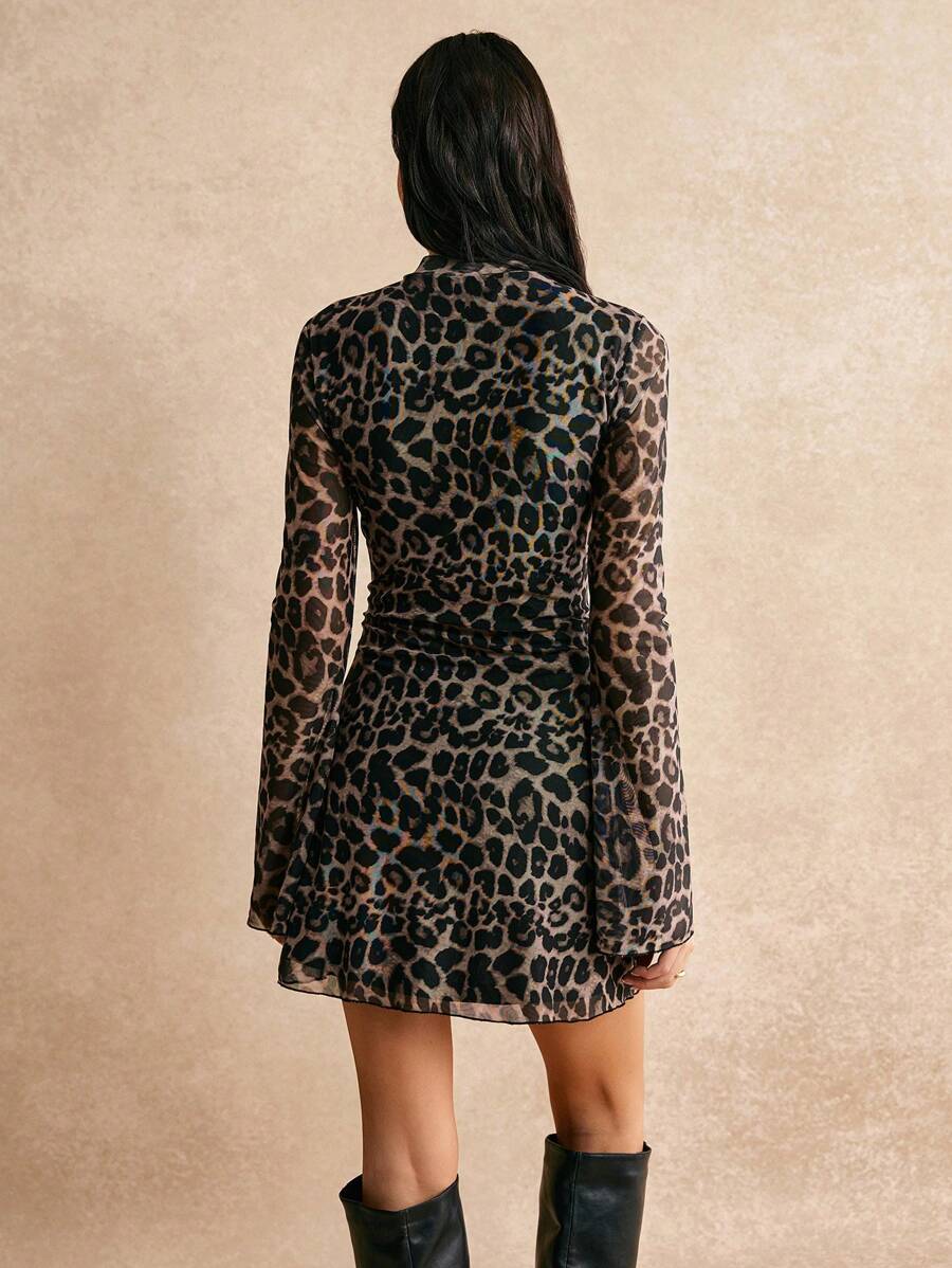 Step into Y2K nostalgia with this dreamy dusty rose floral mesh mini dress. The fitted turtleneck bodycon silhouette hugs your curves while delicate bell sleeves add a flirty, feminine touch. Sheer mesh fabric layered with bold floral patterns creates an eye-catching look perfect for parties, nights out, or whenever you want to serve vintage-inspired glam. Whether you're channeling early 2000s vibes or just love a statement piece, this dress delivers playful style with serious attitude.