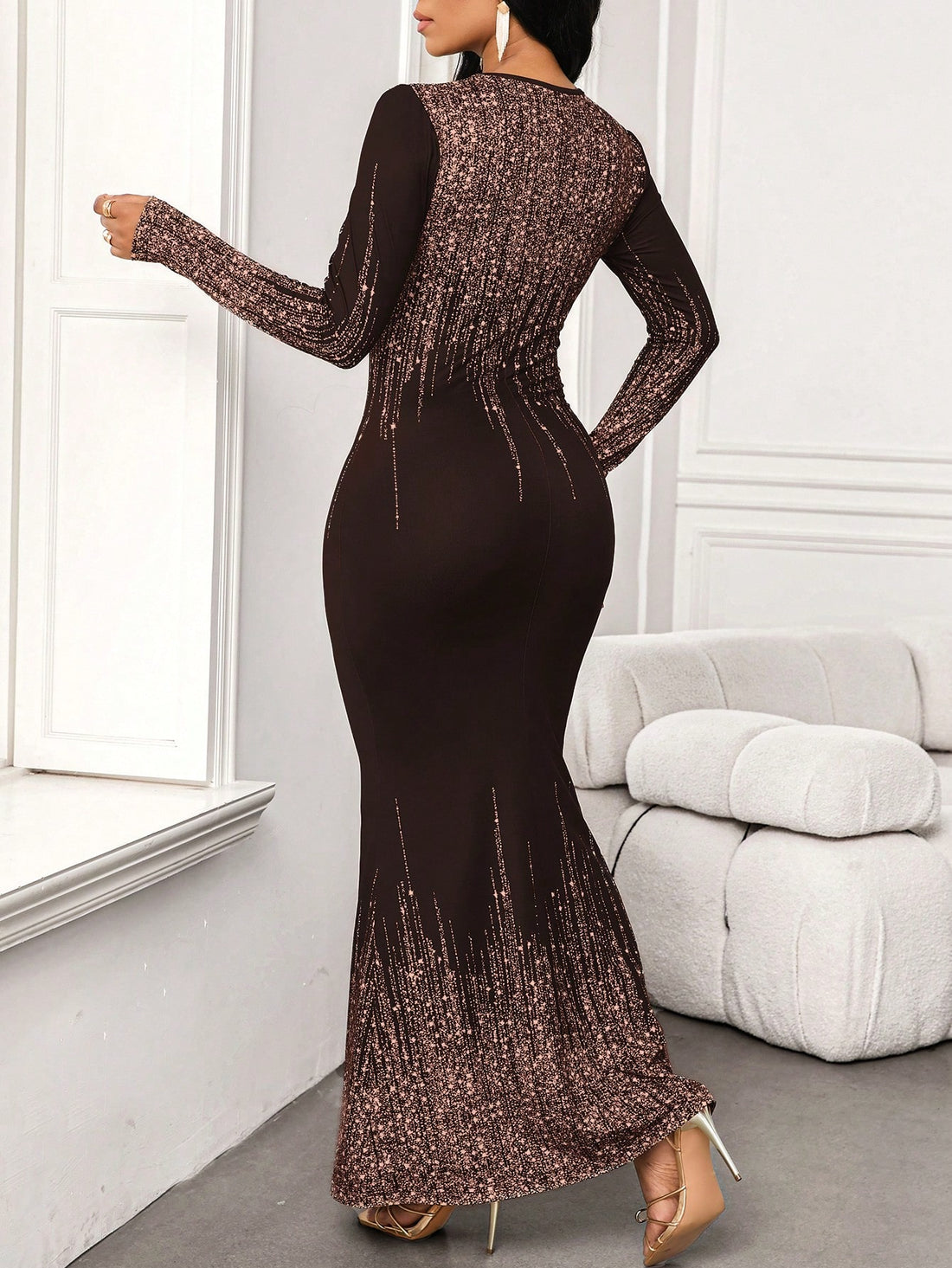 This Elegant Sequin-Printed Long Dress is perfect for sophisticated wedding guests. With its shimmering sequin print, this dress exudes elegance and class. Made from high-quality materials, it offers comfort and style for any wedding event. Elevate your wedding guest outfit with this stunning dress.