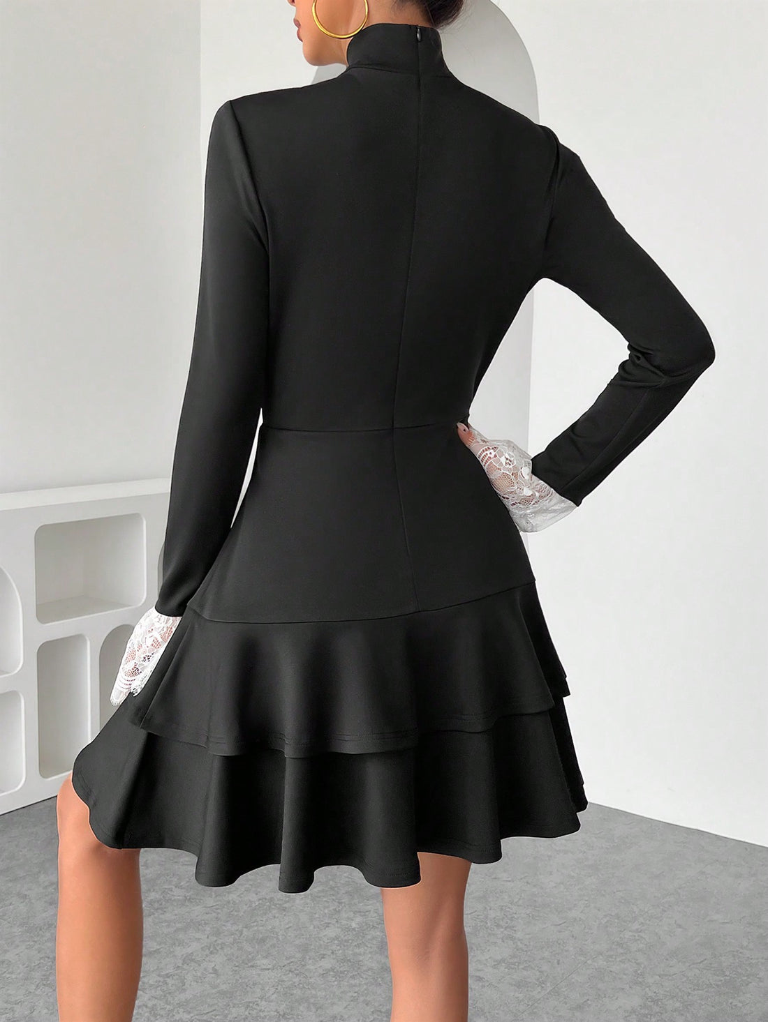 Add a touch of elegance to your wardrobe with our Floral Lace Patchwork Dress. The cinched waist and ruffle accents create a flattering silhouette, while the floral lace adds a touch of sophistication. Perfect for any occasion, you'll feel like a fashion icon in this dress!