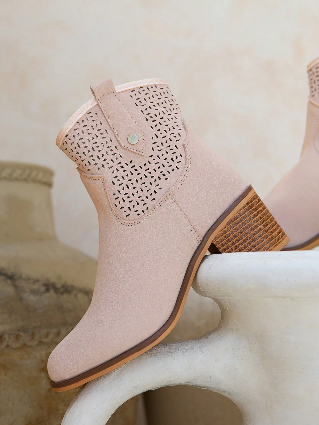 Discover the perfect blend of style and durability with our Chic & Sturdy Western Boots. Featuring a comfortable platform and trendy round toe design, these boots also include a convenient zipper for easy wear. Elevate your wardrobe with these must-have boots.