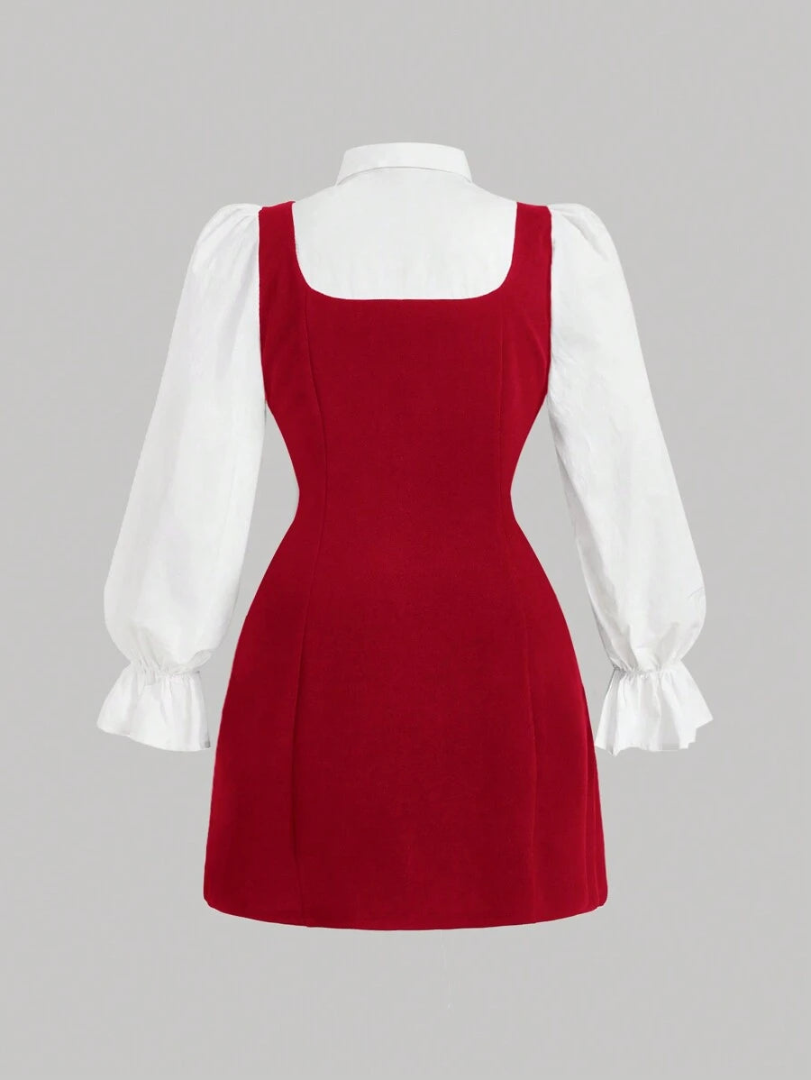 Front view of red plus size mini dress with white puff sleeves and black bow