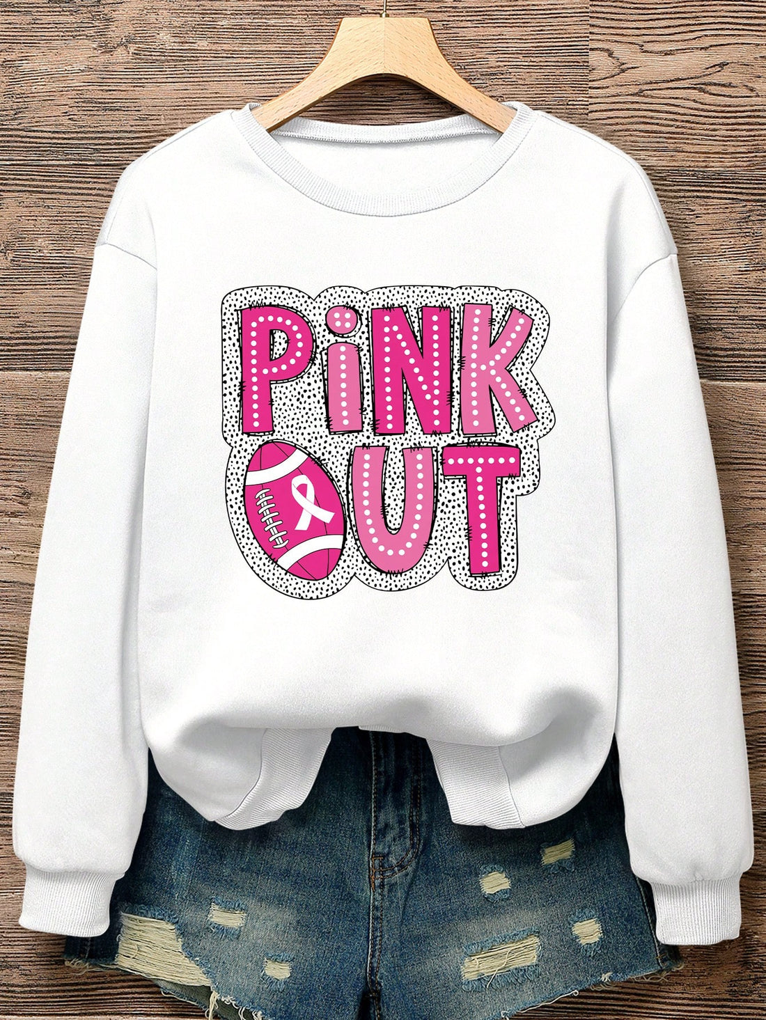 Stay warm and stylish with the Chic & Cozy oversized sweatshirt for women. With a drop shoulder design and football letter print, this sweatshirt is both trendy and comfortable. Made for fashion-forward women, this sweatshirt is perfect for casual outings or cozy nights in.