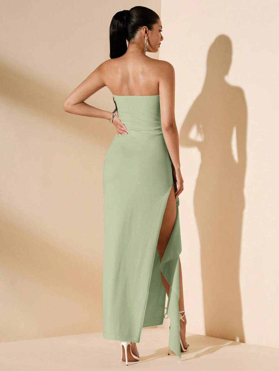 Back view sage green strapless maxi dress with high side slit and long skirt