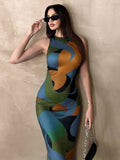 Close-up of green color block ruched waist stretch knit dress