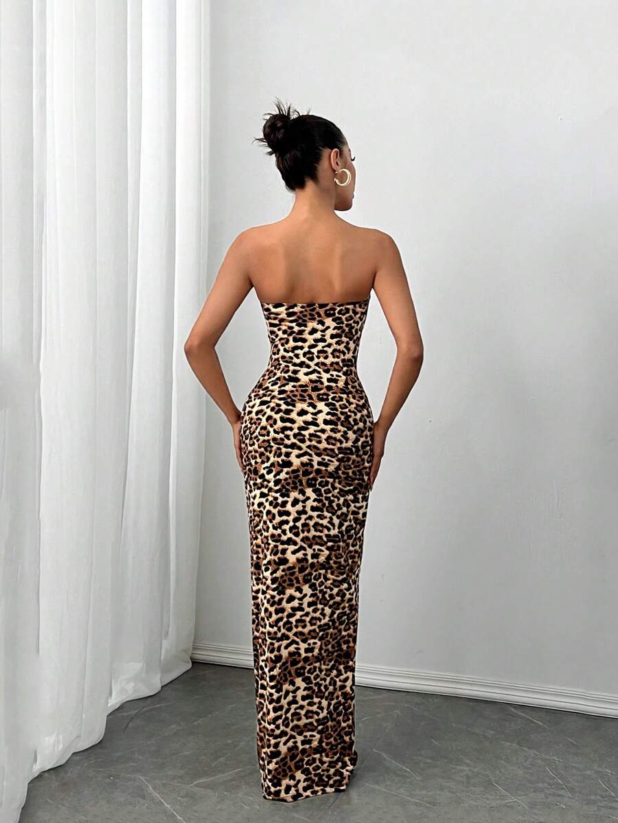 Turn heads at your next autumn or winter celebration in this bold strapless leopard print club dress. The eye-catching animal print brings instant edge and sophistication, while the strapless neckline offers a chic, modern silhouette that's perfect for dancing the night away. Crafted for comfort and style, this dress transitions seamlessly from casual gatherings to upscale parties. Pair it with your favorite heels and statement accessories to complete the look. Whether you're hitting the club or attending a
