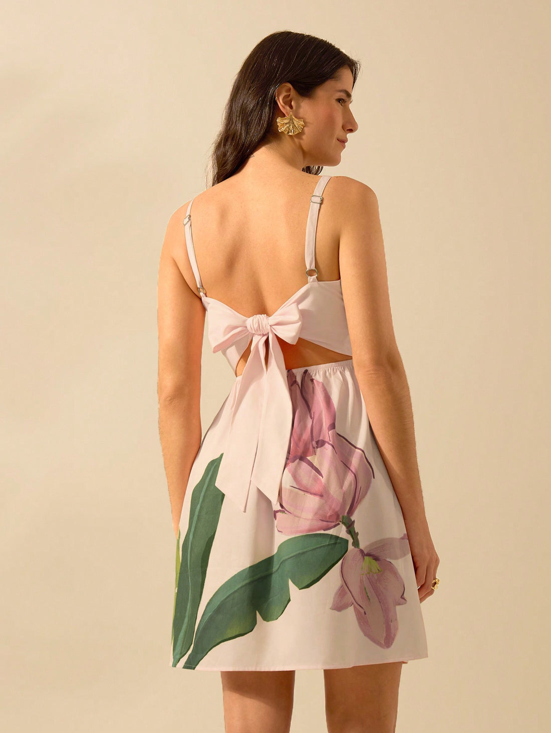 Make a statement with our Boho Tropical Vibes dress, featuring a playful pink banana tree print and a flattering halter design. Perfect for effortless summer style with a touch of quirkiness.