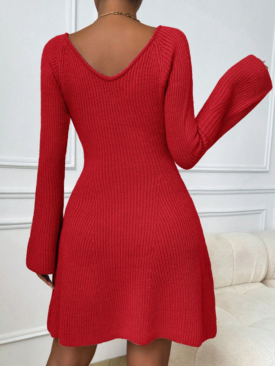 Introducing Cozy Chic: the V-Neck Bell Sleeve Sweater Dress for Effortless Autumn Style. This dress combines cozy comfort with chic style, featuring a flattering V-neckline and elegant bell sleeves. Stay stylish and comfortable all season long.
