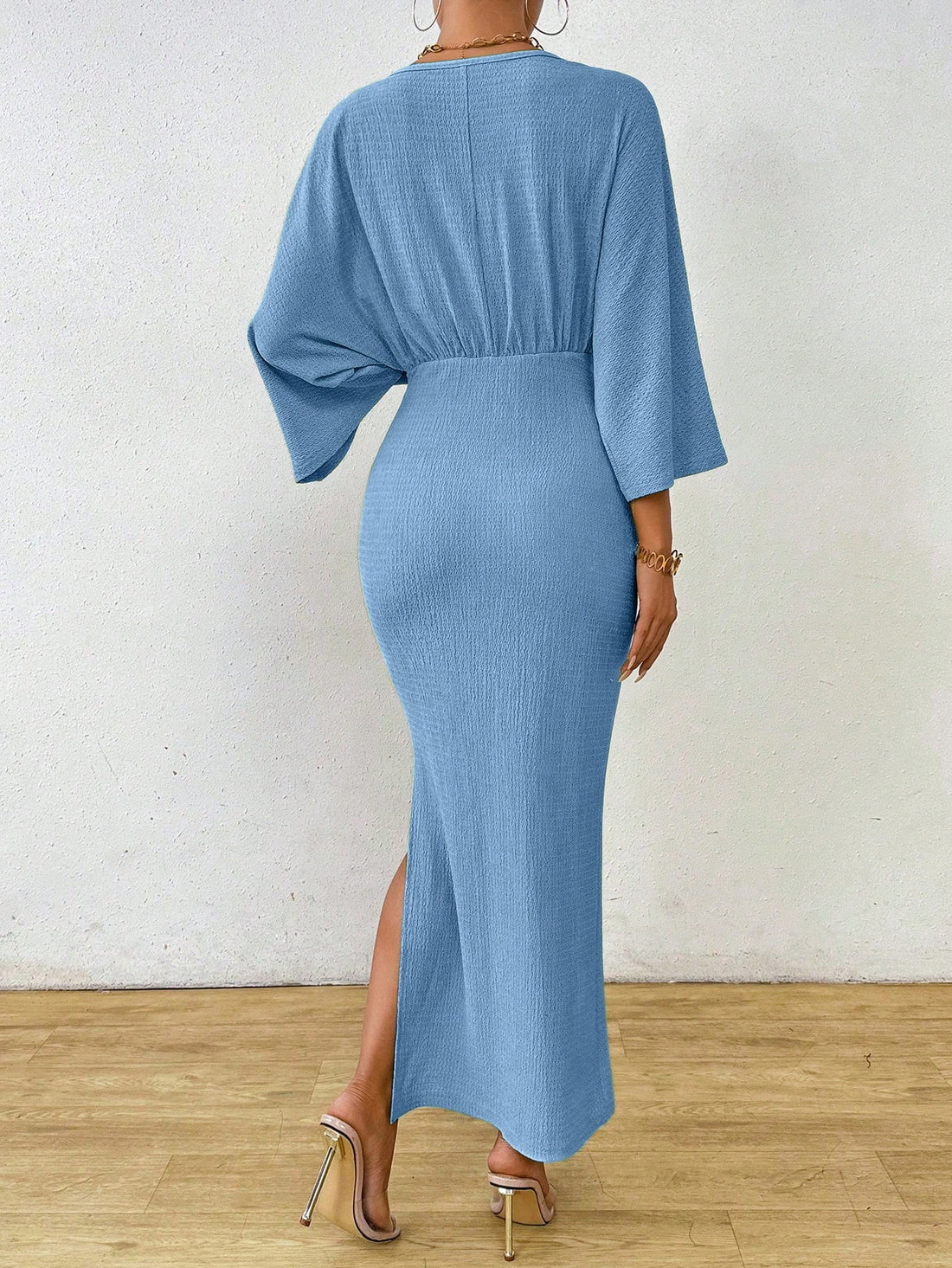Step out in playful style with the Clasi Women's Minimalist Solid Color Front Tie Long Sleeve Maxi Dress. This quirky dress features a front tie and a slit for added fun and fashion. Its minimalist design is perfect for any occasion, making you stand out in the most playful way possible. (No pun intended!)