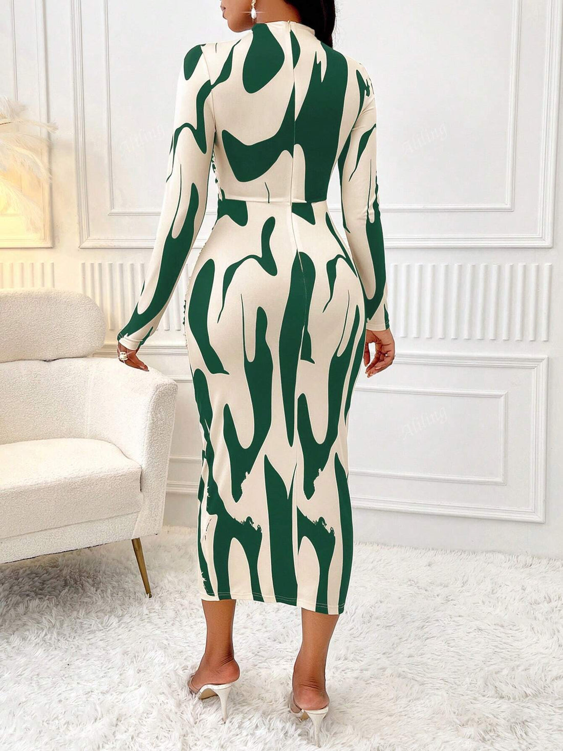 Indulge in the enchanting beauty of our Floral Fantasy dress. With a feminine pleated collar, cropped waist, and elegant long sleeves, this dress will bring out your inner goddess. Make a statement at any occasion and feel confident and alluring.