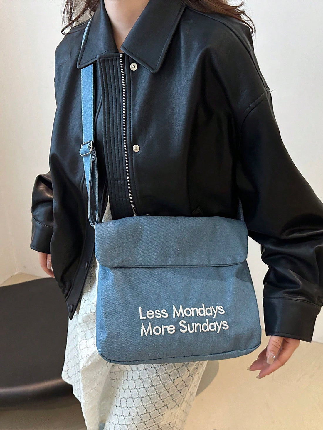 Elevate your office style with our chic and versatile crossbody bag. Made with solid colors and detailed with elegant letter embroidery, this bag exudes professionalism and trendiness. Stay organized with multiple compartments and elevate your look with this stylish accessory.