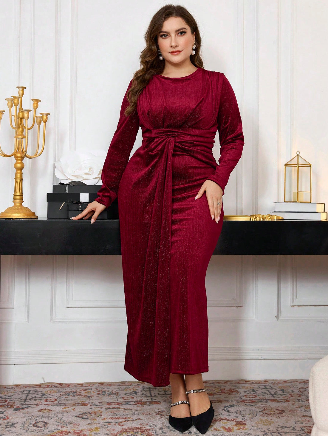 Step into cozy charm with this Plus Size Burgundy Red Twist Knit Midi Dress. Its flattering twist detail and fitted silhouette highlight your curves while long sleeves keep you comfy on crisp spring and autumn days. Perfect for fun outings or casual gatherings, this dress blends style and warmth in one effortlessly chic package.