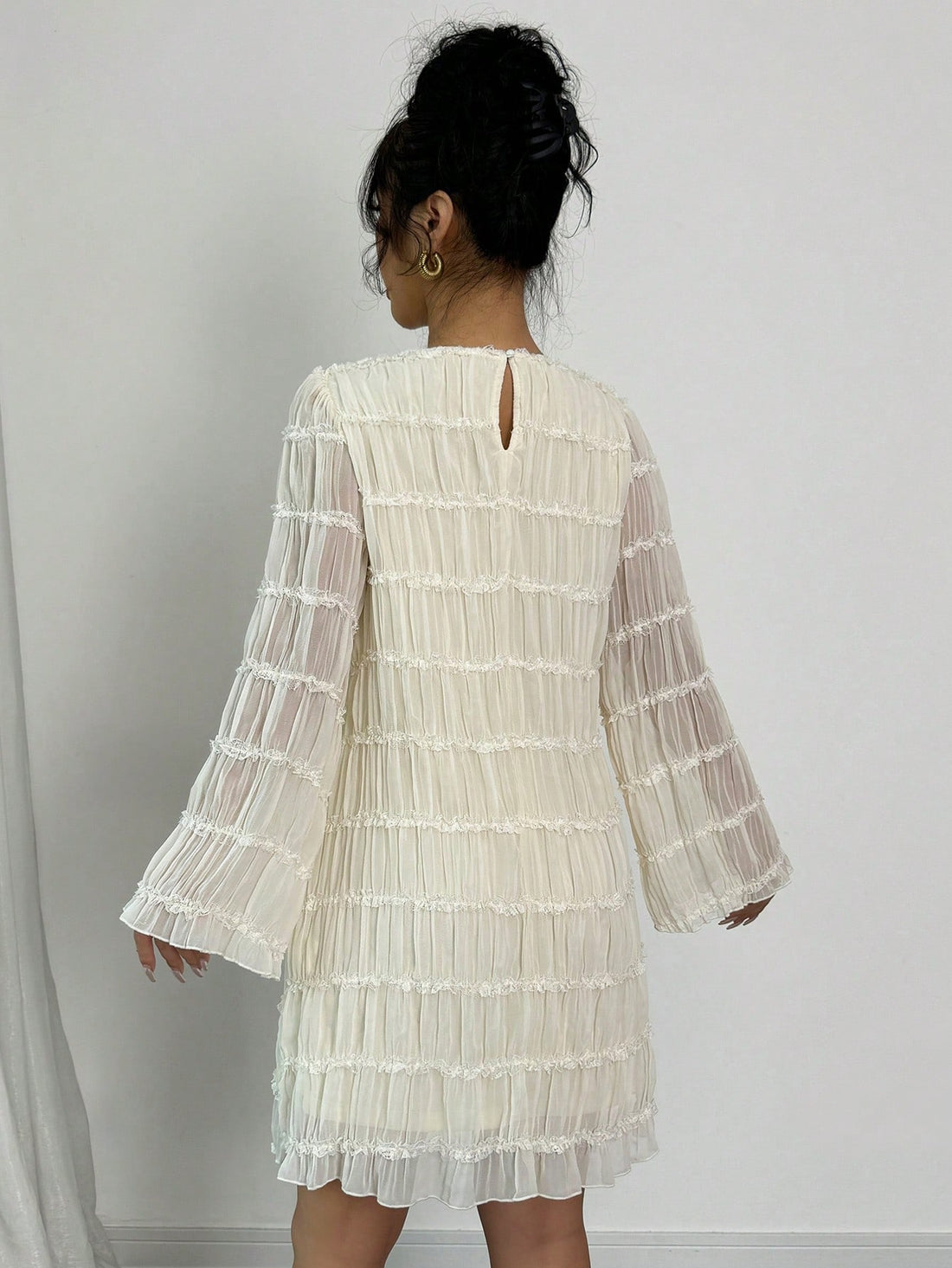 Elevate your style with our Graceful Midi Dress! This elegant dress features a pleated chiffon floral design in a soft apricot color, with long sleeves for added sophistication. Perfect for any occasion, it exudes both grace and elegance. Handcrafted with care and attention to detail.