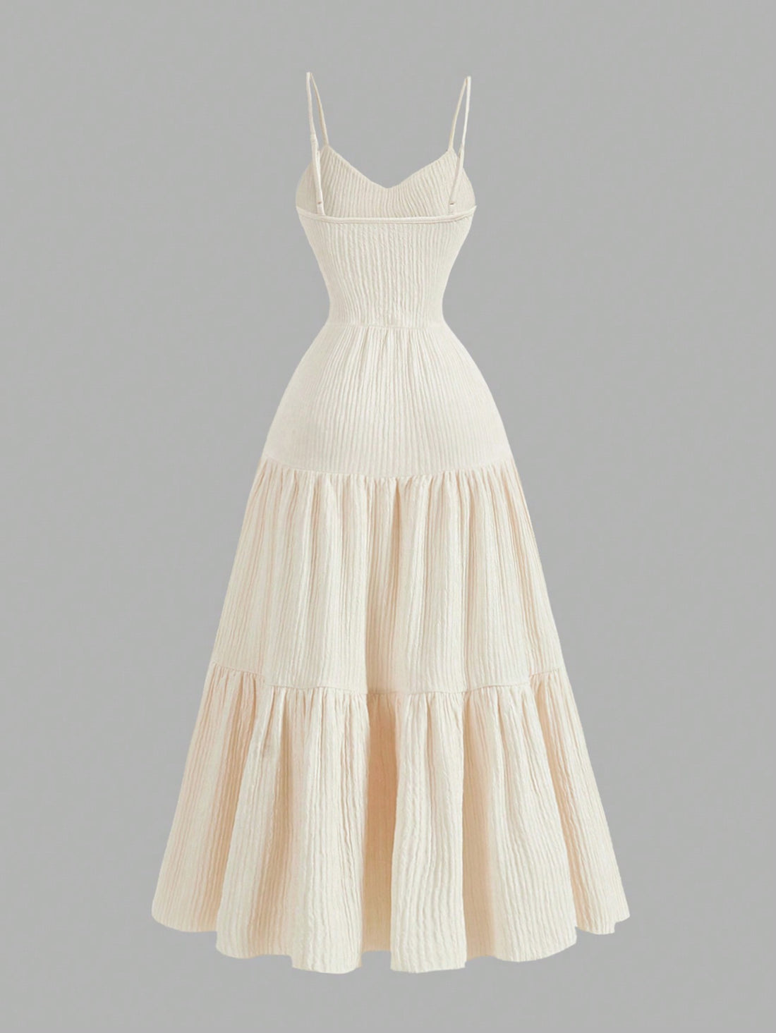 Get ready to be the belle of the New Year's ball with our Elegant Apricot Spaghetti Strap Tiered Ruffle Dress! With its delicate ruffles and flattering spaghetti straps, you'll be turning heads all night long. Perfect for any celebration, this dress will have you feeling confident and stylish. Don't miss out on the fun, grab yours today!