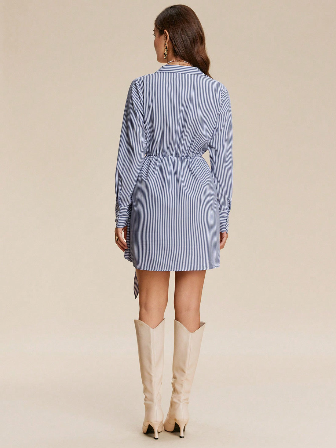 Discover your new go-to dress with this Chic High-End Blue and White Striped Casual Dress! The unique niche design makes it stand out from the rest, while the chic blue and white stripes add a touch of playfulness. Perfect for any occasion, this dress is a must-have in your wardrobe.