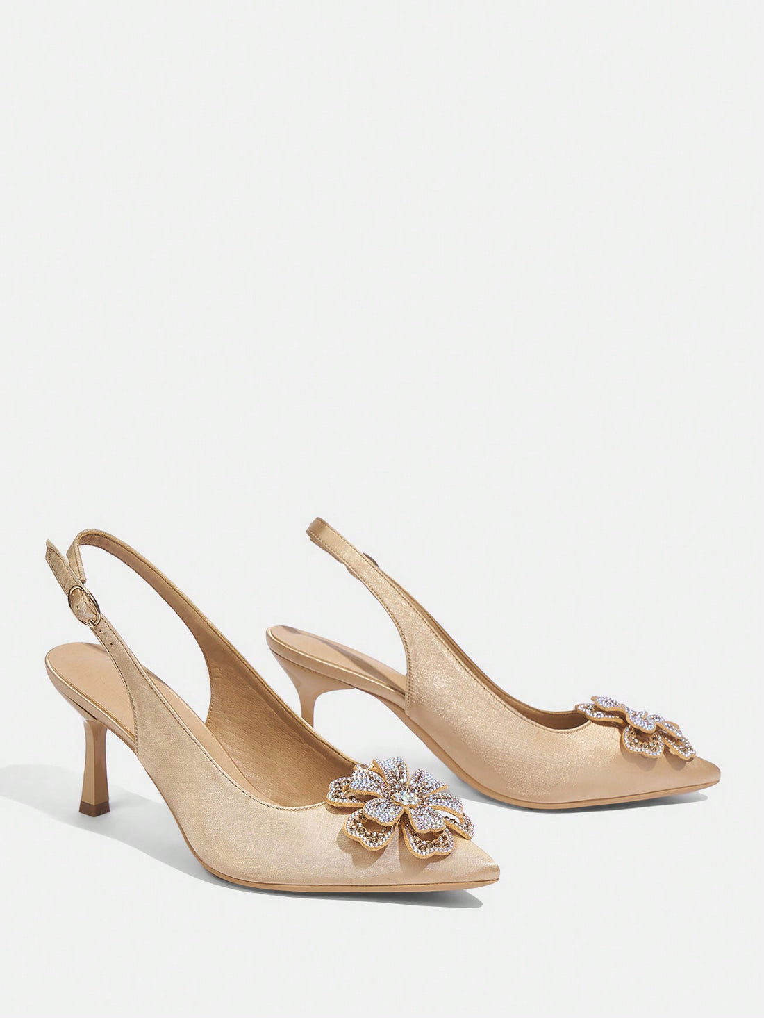 Elevate your style with our Women's Pointed Toe Rhinestone High Heels. These sexy silk slip-on pumps are perfect for Spring and Summer. Featuring a pointed toe design and sparkling rhinestone details, these heels are sure to make you stand out. Step into sophistication and comfort with our stunning heels.