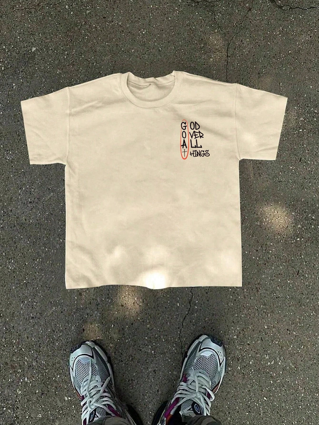 Upgrade your casual style with this graphic print short sleeve t-shirt. The trendy khaki color adds a unique touch to your wardrobe while the loose fit provides comfort and versatility. Perfect for a laid-back look with a playful touch. (No boring plain tees here!)