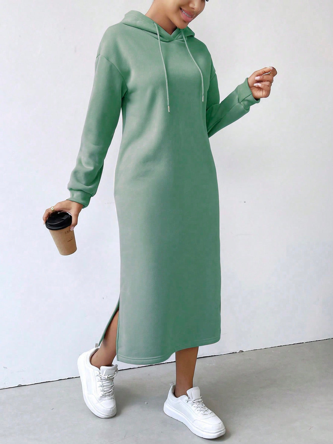 Cozy Chic: Fleece-Lined Hoodie Dress is the perfect addition to any autumn wardrobe. The soft fleece lining provides ultimate warmth and comfort, while the stylish hoodie design adds effortless style to any outfit. Stay cozy and chic this season with our must-have dress.