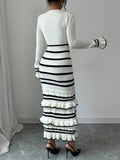Black and white striped knit midi sweater dress with tiered ruffle hem, back view