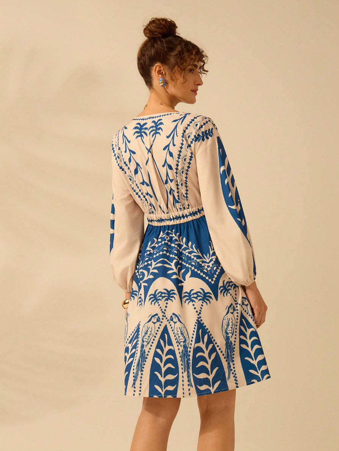 Be the talk of the island with our Boho Tropical Paradise Dress! Featuring a deep v-neck and lantern sleeves, this dress is perfect for a day in the sun. With a playful print of coconut trees and parrots, you'll feel like you're in paradise. Get ready to turn heads and embrace your inner bohemian goddess.