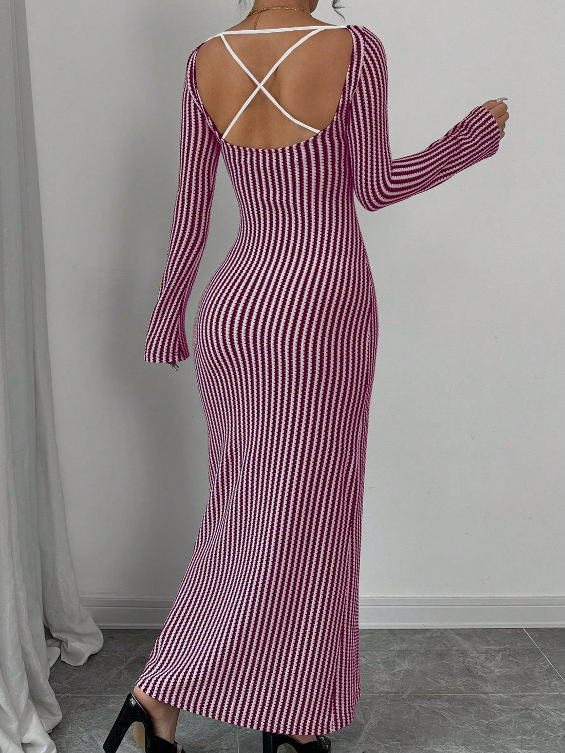 This Chic Striped Backless Dress is the perfect choice for any occasion. Its elegant and sophisticated design, combined with a comfortable fit and stylish striped pattern, make it a versatile and stylish option for any event. Stand out in this dress and exude confidence and grace.