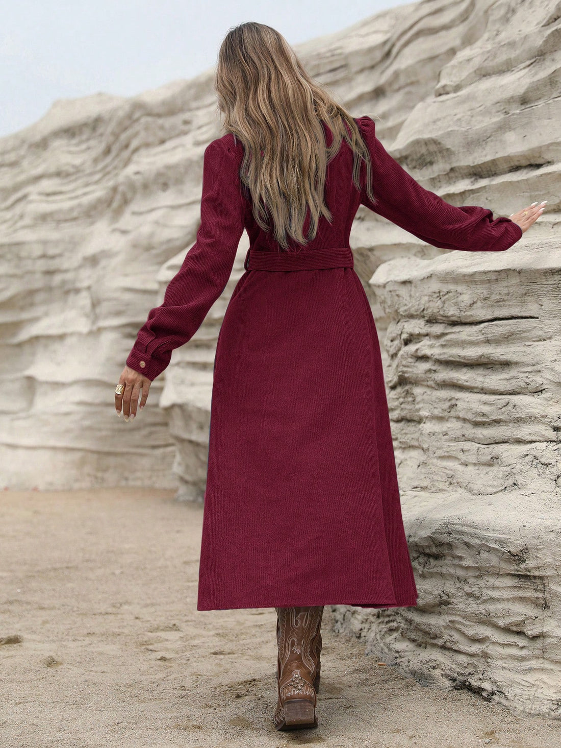 Elevate your style with our Vintage Chic dress. Featuring elegant puff sleeves, a belted waist, and button detailing, this corduroy dress exudes sophistication. With its timeless design and flattering fit, this dress will add a touch of vintage charm to any wardrobe.
