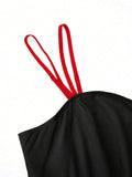 Back upper bodice close up of black satin dress with red adjustable spaghetti straps